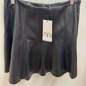 Elejant  Miniskirt Brand SARA  colors Black size L Women 100%Poliuretano